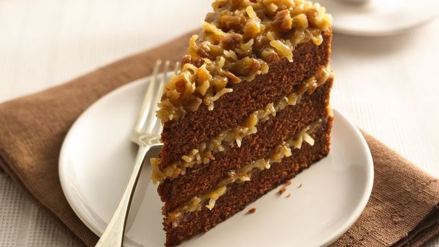 German chocolate cake layered with coconut-pecan filling and chocolate frosting