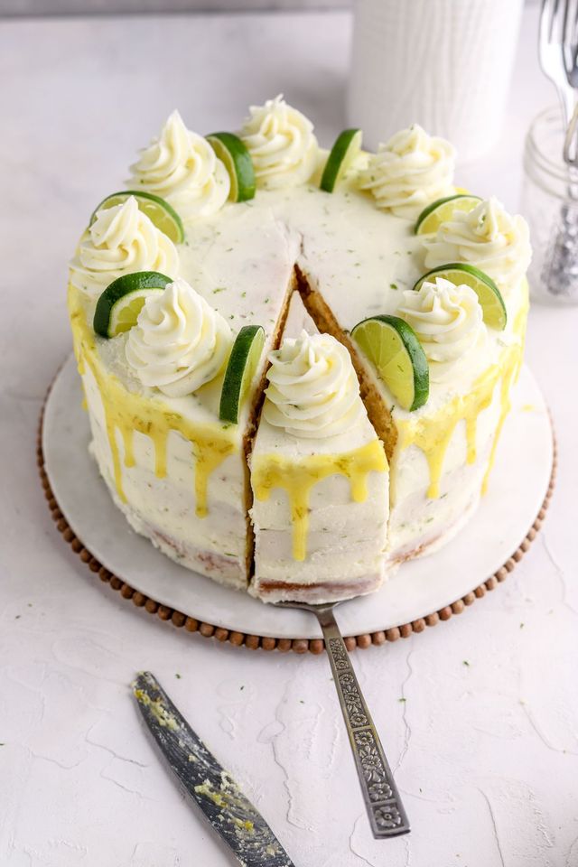 Key lime cake with pale green tinted frosting and a tangy lime filling